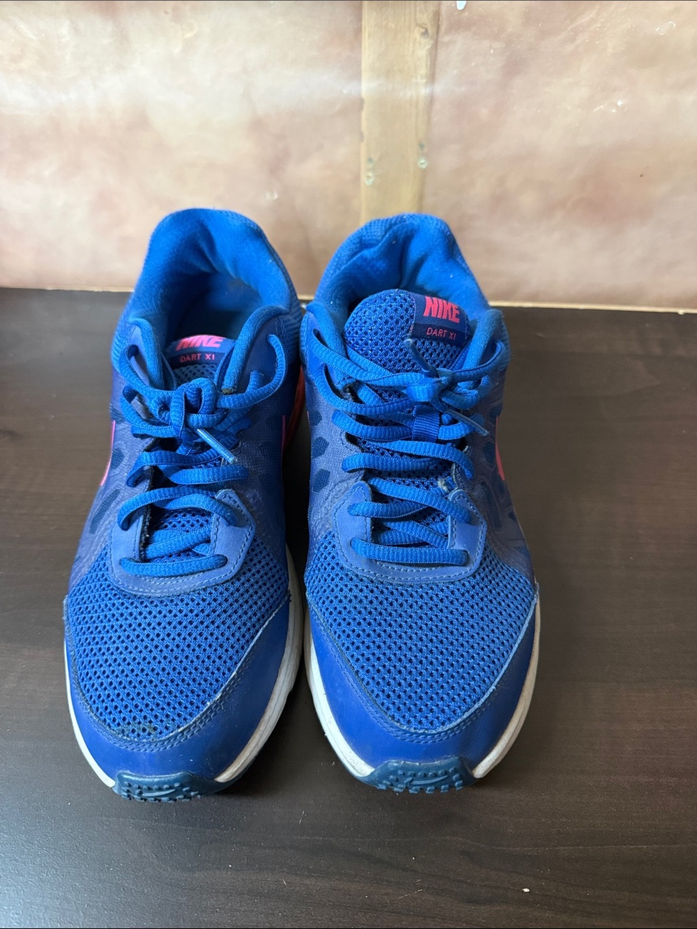 Nike Blue Athletic Running Shoes with Pink Accents